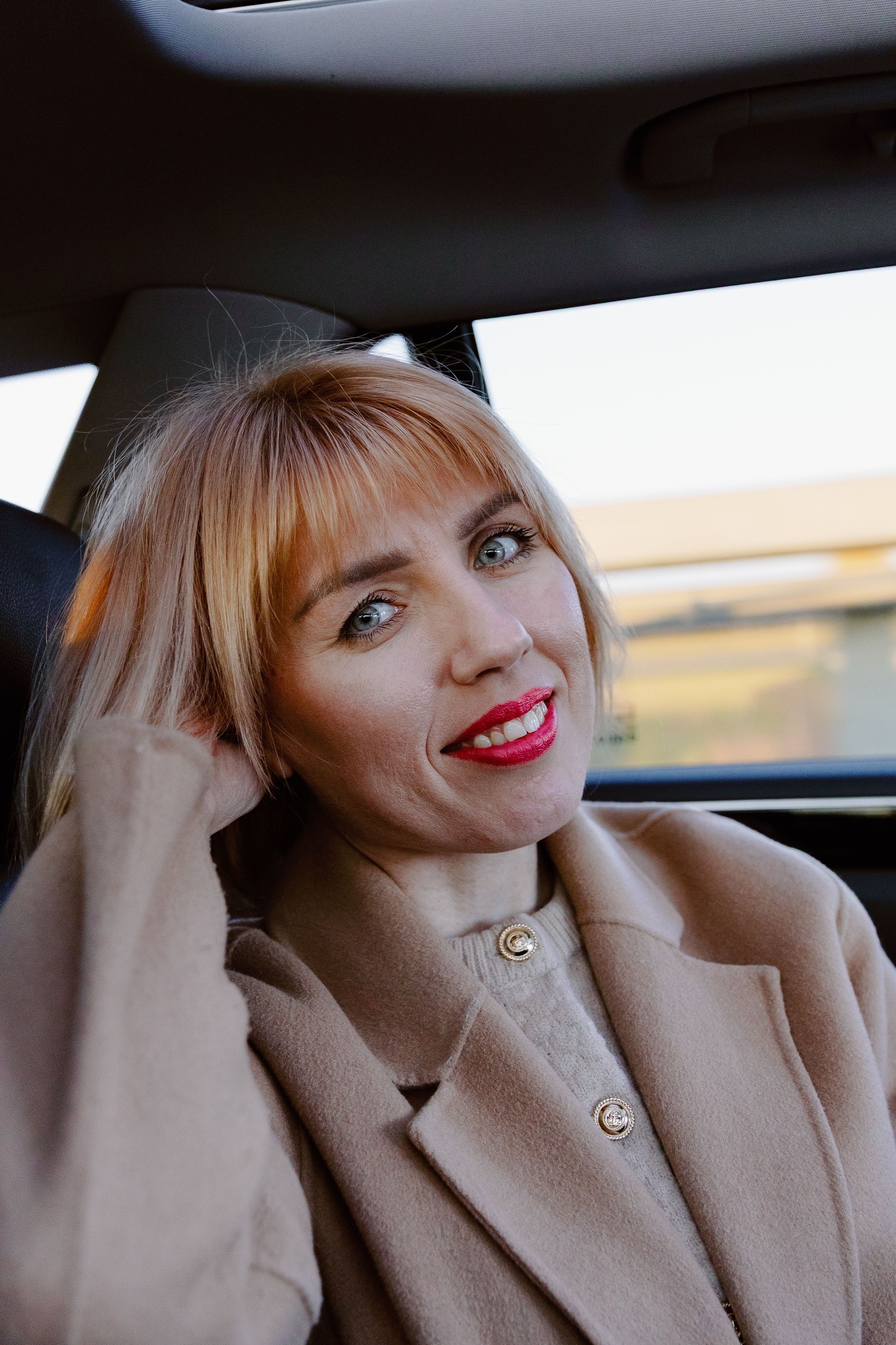 Portrait Of Happy Business Woman Sitting In Car.
