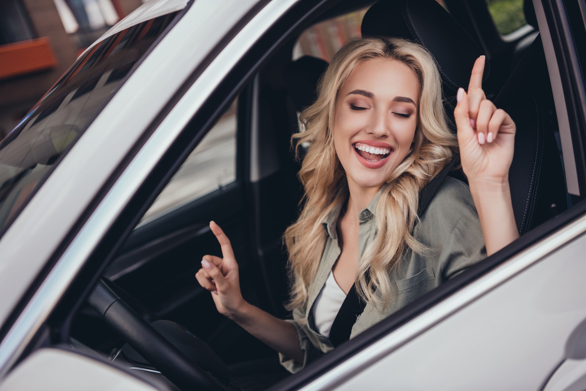 Photo of sweet pretty lady driver ride auto outside town listen sound system dynamic stereo volume melody dance